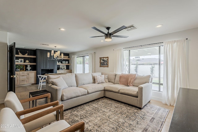 8320 E Monte Vista Rd, Scottsdale, AZ 85257 - living room featuring a ceiling fan, recessed lighting, and light wood-type flooring