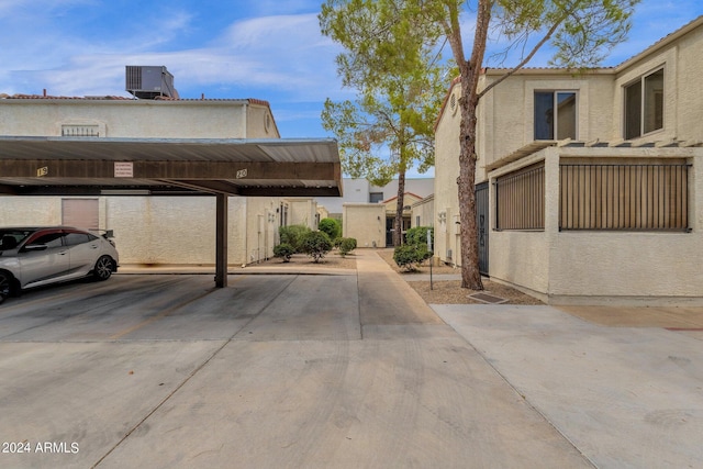 view of parking featuring a carport