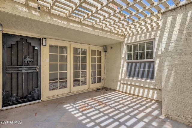 view of patio featuring a pergola