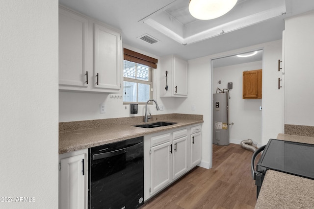 kitchen with sink, white cabinetry, light wood-type flooring, electric water heater, and black appliances