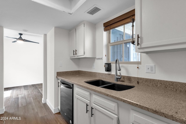 kitchen with white cabinetry, dishwasher, sink, ceiling fan, and light hardwood / wood-style flooring