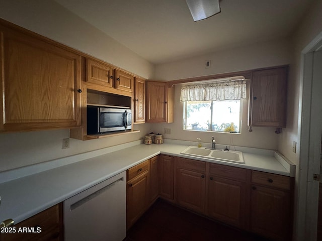 kitchen featuring dishwasher and sink