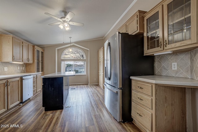 kitchen with ceiling fan, decorative backsplash, pendant lighting, and light brown cabinets