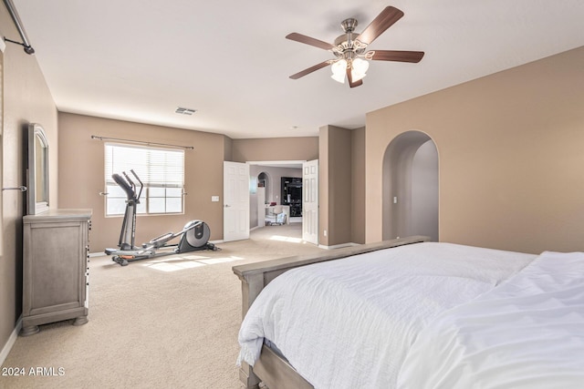 3964 E Hummingbird Ln, Phoenix, AZ 85050 - bedroom featuring arched walkways, carpet flooring, baseboards, and a ceiling fan