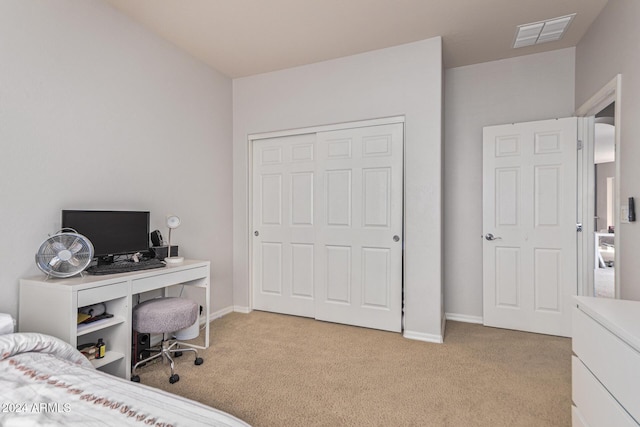 3964 E Hummingbird Ln, Phoenix, AZ 85050 - bedroom with light carpet, a closet, and baseboards