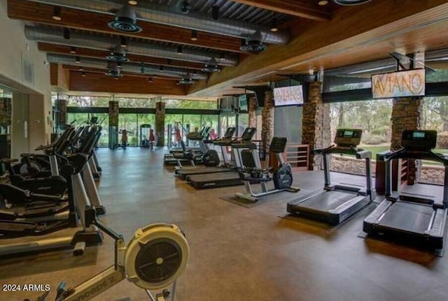 3964 E Hummingbird Ln, Phoenix, AZ 85050 - exercise room featuring beam ceiling