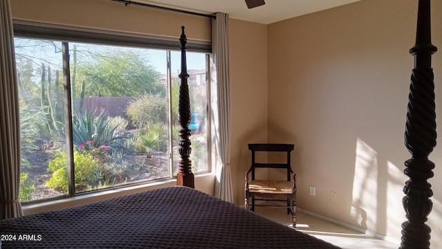 41318 N Belfair Way, Anthem, AZ 85086 - bedroom with tile patterned flooring and baseboards