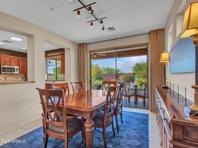 41318 N Belfair Way, Anthem, AZ 85086 - dining space featuring light tile patterned flooring