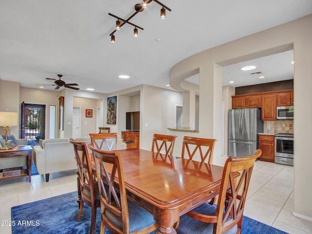 41318 N Belfair Way, Anthem, AZ 85086 - dining space featuring light tile patterned floors, recessed lighting, and ceiling fan