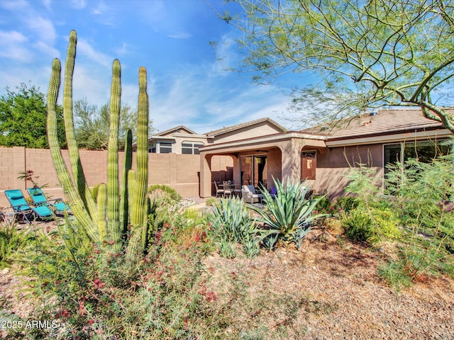 41318 N Belfair Way, Anthem, AZ 85086 - back of house featuring a fenced backyard and stucco siding