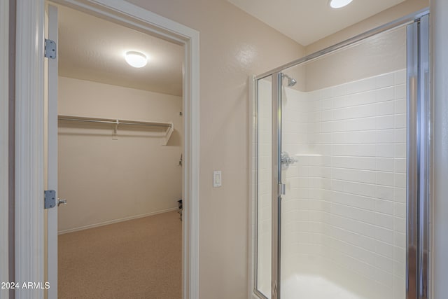 bathroom featuring walk in shower