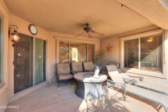 view of patio featuring ceiling fan