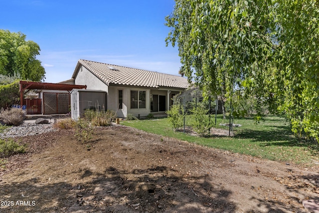 1135 W Sea Fog Dr, Gilbert, AZ 85233 - rear view of house with a tile roof and stucco siding