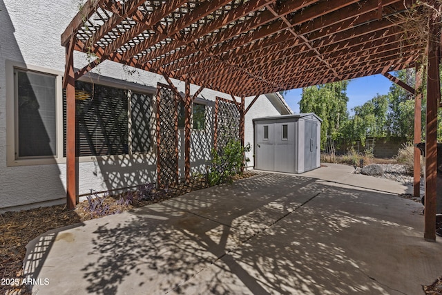 1135 W Sea Fog Dr, Gilbert, AZ 85233 - view of patio with a storage unit and a pergola