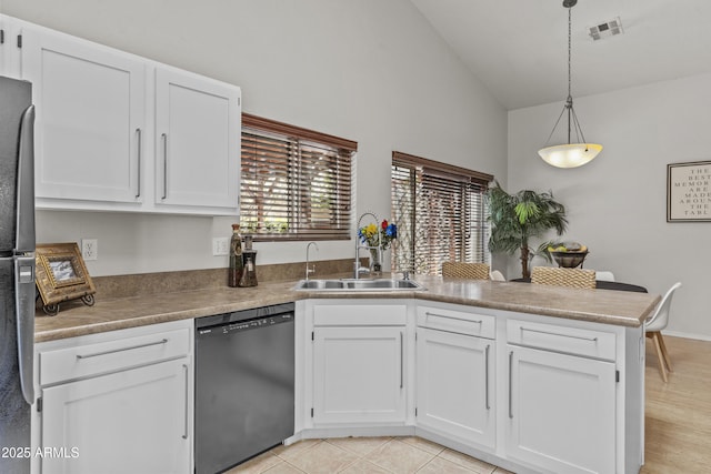 1135 W Sea Fog Dr, Gilbert, AZ 85233 - kitchen with dishwasher, a peninsula, white cabinets, freestanding refrigerator, and decorative light fixtures
