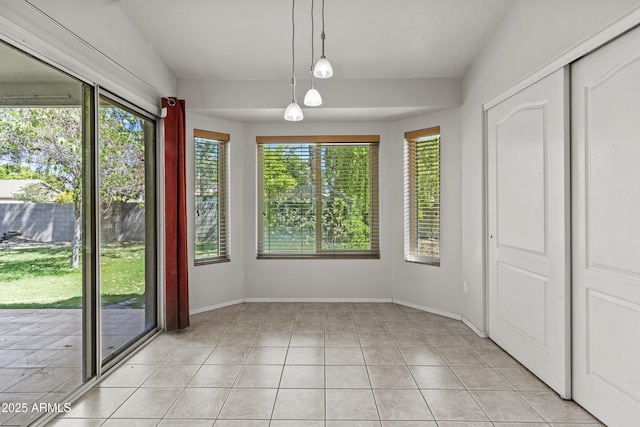 1135 W Sea Fog Dr, Gilbert, AZ 85233 - unfurnished dining area featuring light tile patterned floors and baseboards