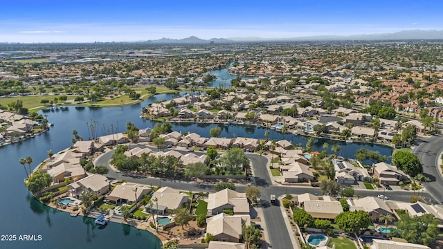 1135 W Sea Fog Dr, Gilbert, AZ 85233 - aerial view of property's location featuring nearby suburban area and a water and mountain view