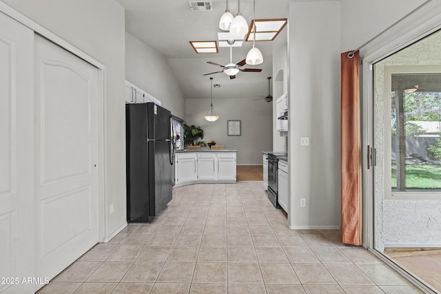 1135 W Sea Fog Dr, Gilbert, AZ 85233 - kitchen with black appliances, ceiling fan, white cabinetry, vaulted ceiling, and light tile patterned flooring