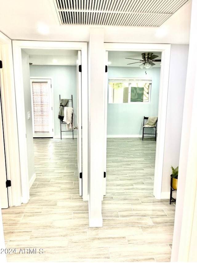 hall featuring light hardwood / wood-style floors