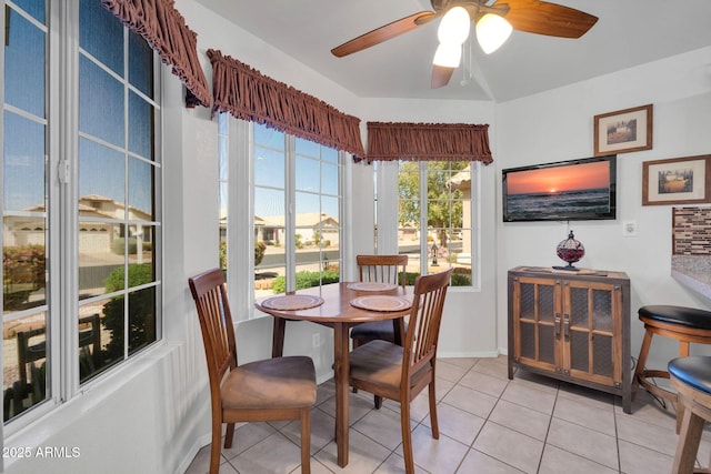 10745 W Beaubien Dr, Sun City, AZ 85373 - dining room featuring baseboards, ceiling fan, and light tile patterned floors