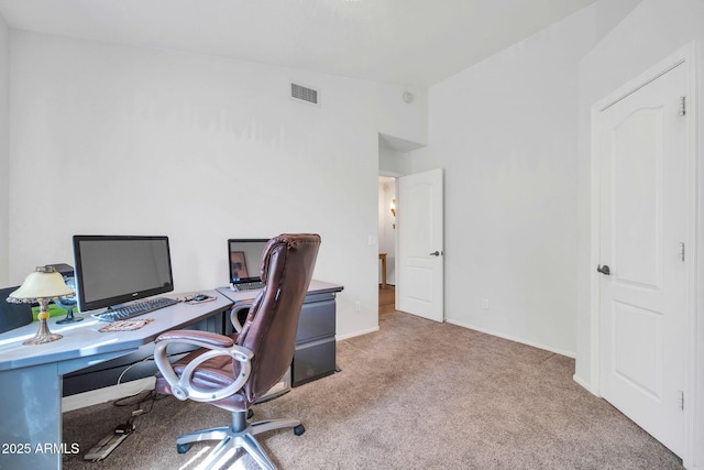 10745 W Beaubien Dr, Sun City, AZ 85373 - office area featuring vaulted ceiling, visible vents, and carpet