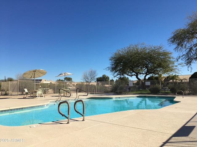 10745 W Beaubien Dr, Sun City, AZ 85373 - pool with fence and a patio