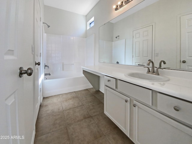 bathroom with shower / bath combination, vanity, and tile patterned floors