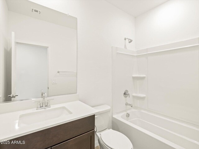 full bathroom with vanity, toilet, and shower / bathing tub combination