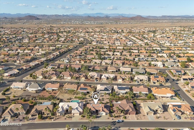 drone / aerial view with a mountain view and a residential view