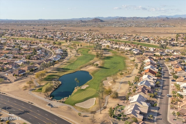 bird's eye view featuring a residential view, a water and mountain view, and view of golf course