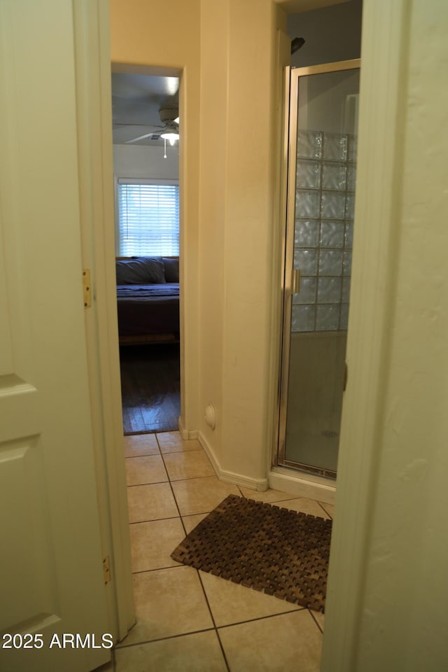 5720 S 21st Ter, Phoenix, AZ 85040 - ensuite bathroom with tile patterned floors and a shower stall