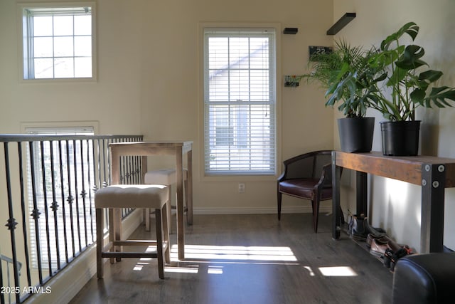 5720 S 21st Ter, Phoenix, AZ 85040 - home office featuring wood finished floors, healthy amount of natural light, and baseboards