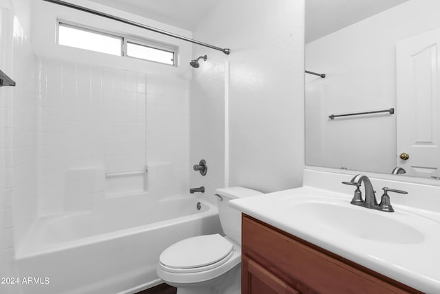 full bathroom featuring toilet, vanity, and bathtub / shower combination