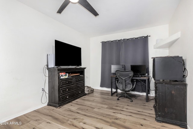 home office with ceiling fan and light wood-type flooring