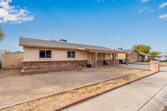 single story home with central air condition unit