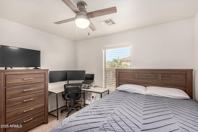 bedroom featuring ceiling fan and light colored carpet