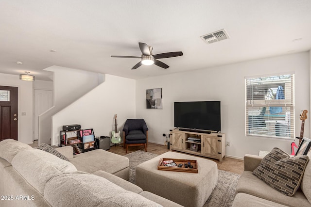 living room featuring ceiling fan