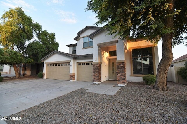 view of front of home with a garage