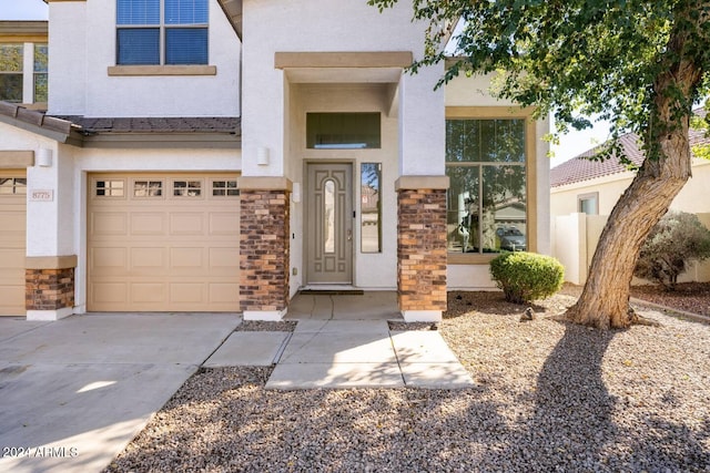 property entrance with a garage