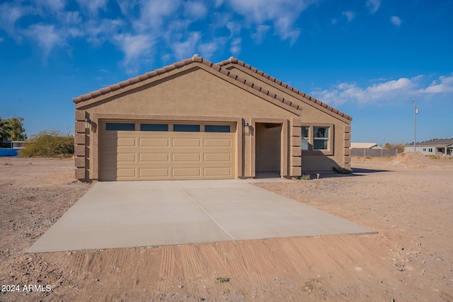 view of front of home with a garage