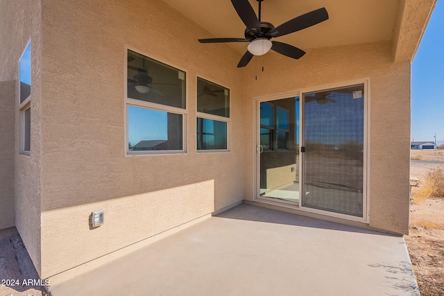 view of patio / terrace featuring ceiling fan