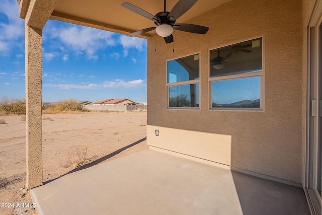 view of patio featuring ceiling fan