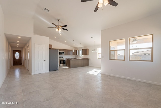 unfurnished living room featuring high vaulted ceiling, a notable chandelier, and light tile patterned flooring