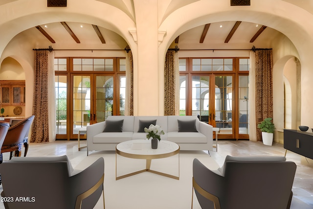 interior space with beam ceiling, french doors, and plenty of natural light