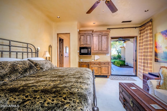 carpeted bedroom with access to exterior and ceiling fan