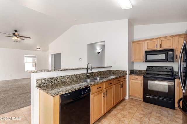 2433 W Hayden Peak Dr, San Tan Valley, AZ 85144 - kitchen with vaulted ceiling, a ceiling fan, a sink, black appliances, and a peninsula