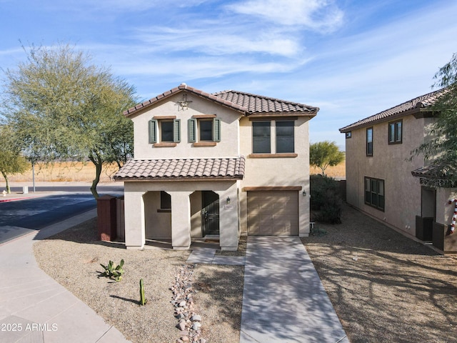 mediterranean / spanish-style house featuring a garage