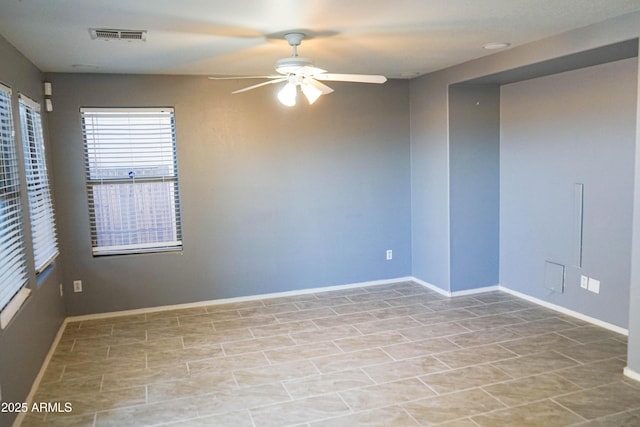 empty room with ceiling fan