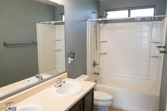 full bathroom featuring vanity, toilet, and shower / washtub combination