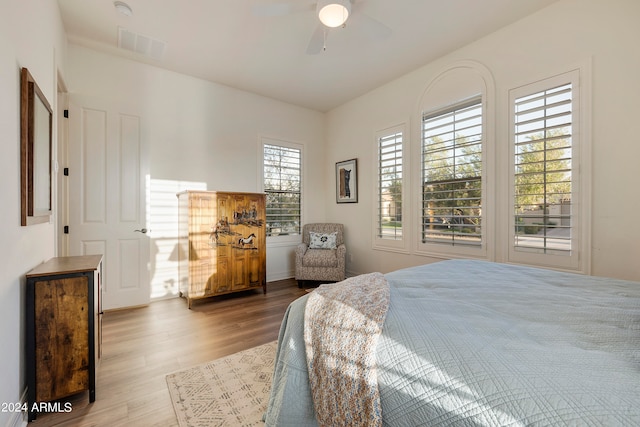 bedroom featuring ceiling fan and hardwood / wood-style flooring